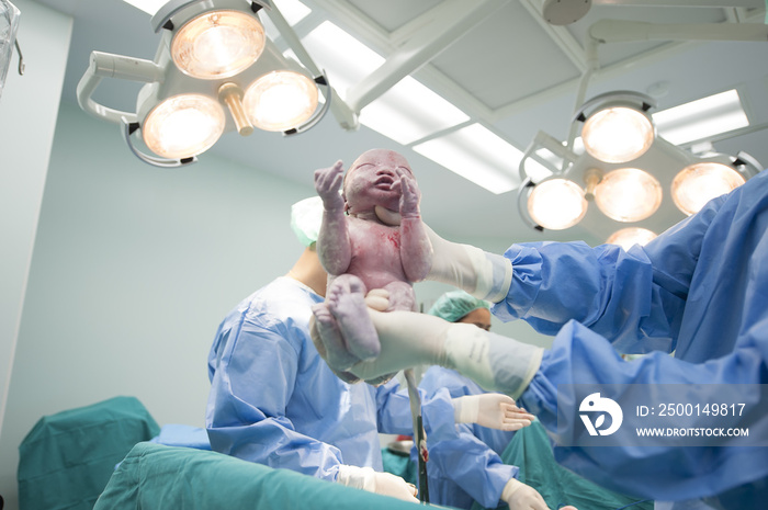 The medical team is performing caesarean sections