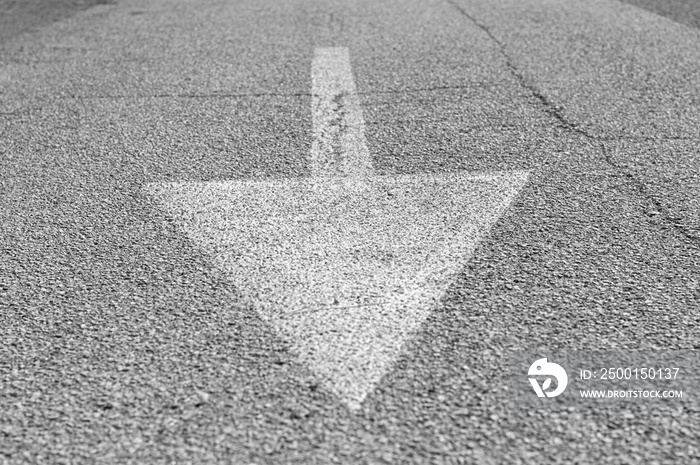 Arrow painted on the asphalt (Pesaro, Italy, Europe)