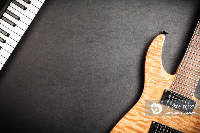 Electric guitar on dark leather background