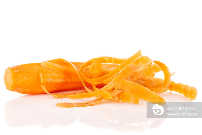 One whole lot of pieces of peeled fresh orange carrot isolated on white background