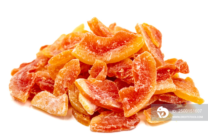 Dried papaya slice isolated on a white background. Dried fruit in sunlight. close up