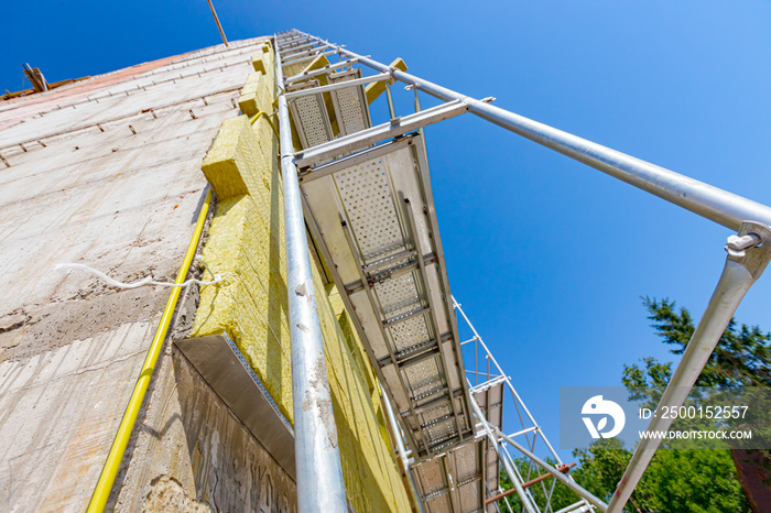 Unfinished thermal wall of residential building, insulation material, rock wool