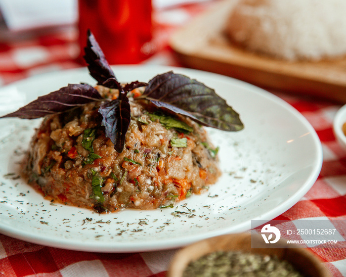 Eggplant caviar served with basil