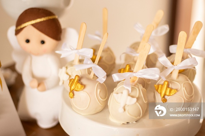 Baby baptism. Sweets and decoration