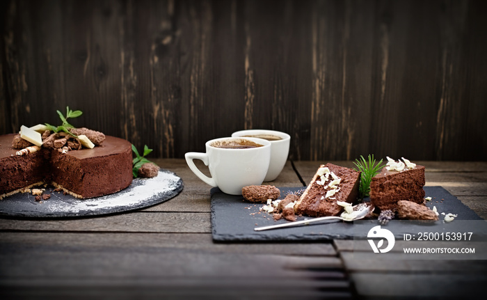 A moment to pause and enjoy the taste, chocolate creamy cake and coffee for pleasure