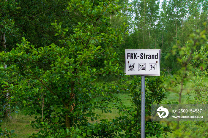 Signpost at Lake Olbersdorfer See marking the beginning of the nudist beach (FKK Strand)