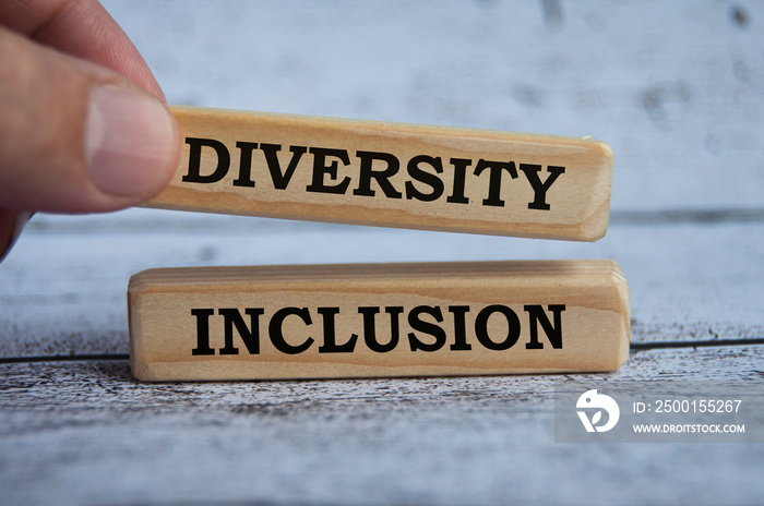 Diversity and inclusion text on wooden blocks with.