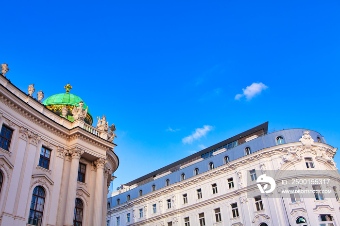 classical Viennese architecture with sculptures on the rooftop