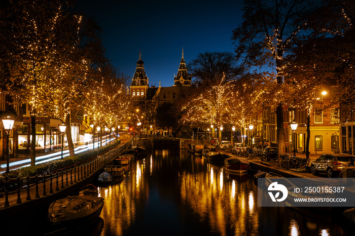 Christmas time in Amsterdam with the Rijksmuseum in Netherlands at twilight