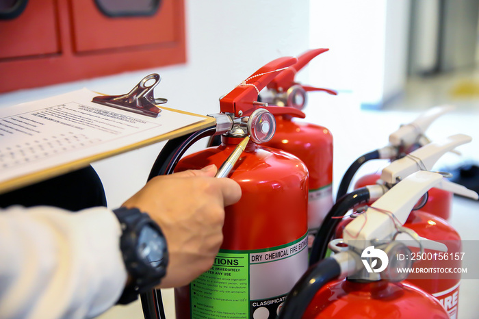 Engineer now inspection services red fire extinguishers tank concepts of fire station for emergency prevention rescue and fire safety training.