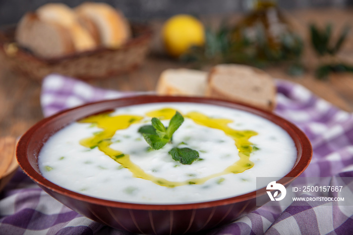 Cacik (traditional Turkish yogurt tapas). Traditional Turkish drink cacik or tzatziki . made from yogurt and cucumbers.