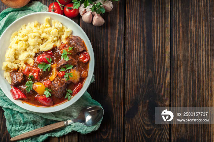 Hungarian beef goulash serwed with galuska noodles