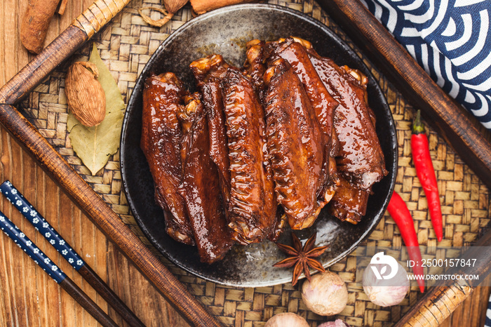 The duck’s wings were boiled and placed on a  plate