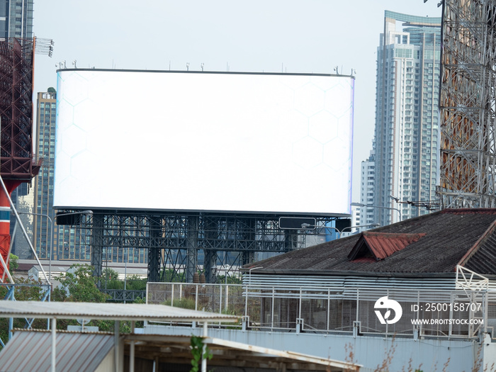 blank LED bilboard on tower and on city background