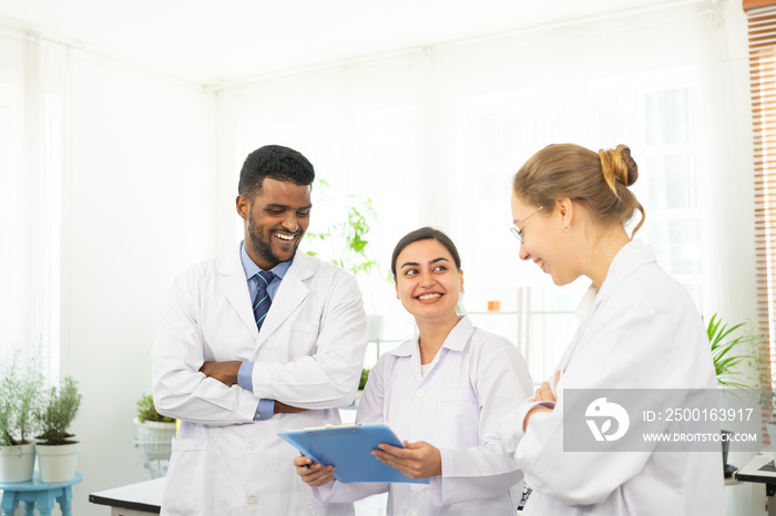 Happy teams of scientists experiment and research extraction from bio plant lab. international group of scientists. scientist teamwork.