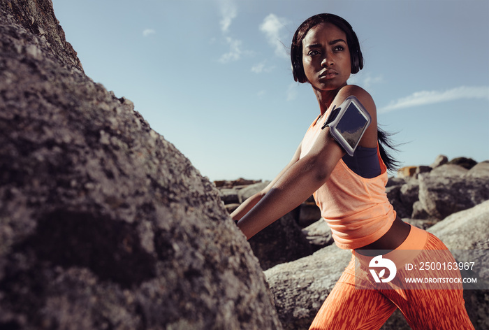 Fitness woman during training session outdoors.