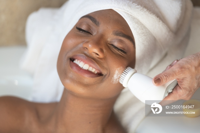 Young African-American Woman Spa Treatment Relaxing