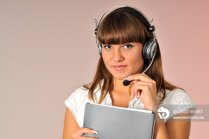 Female consultant with headphones on head