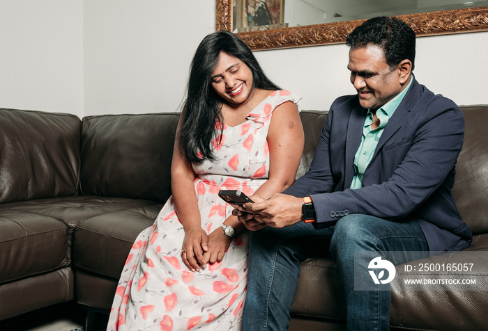 South Asian Family at home spending time together