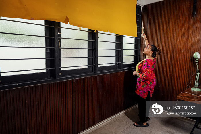 Plus sized female getting her headshots taken by a south asian female photographer