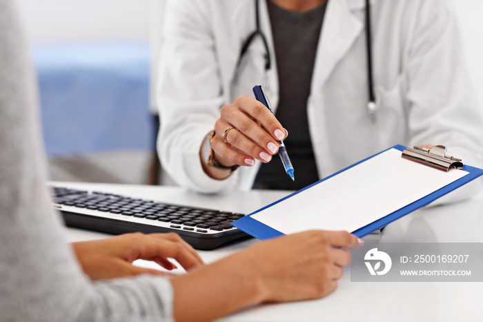 Adult woman having a visit at female doctor’s office