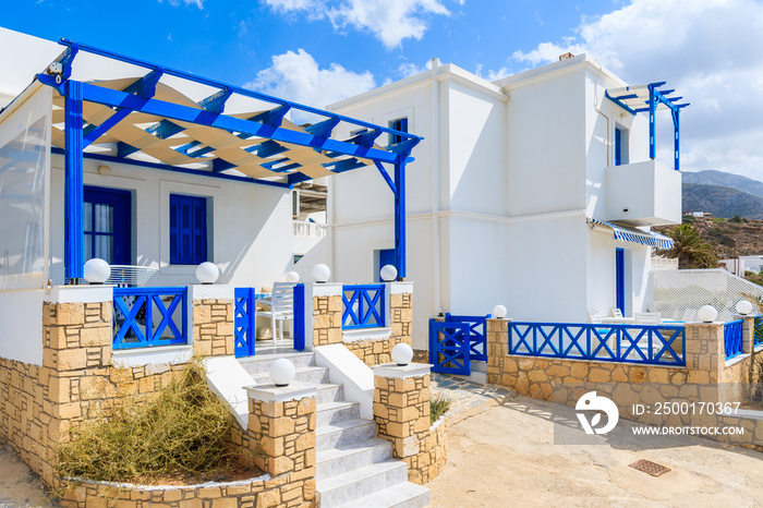 Typical Greek white and blue color tourist apartments in Lefkos village on Karpathos island, Greece