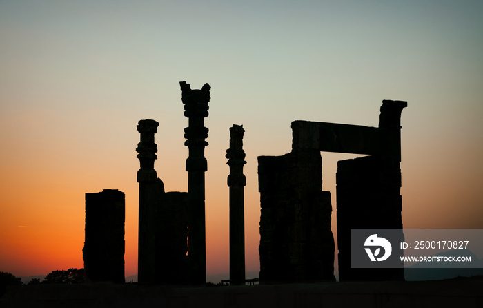 Gate of Xerxes Palace Silhouetted against Sunset in the Ruins of Ancient Persepolis