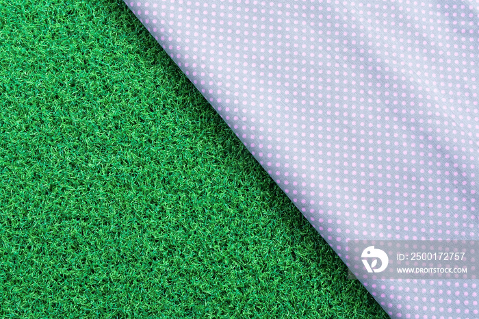 dot fabric on green field