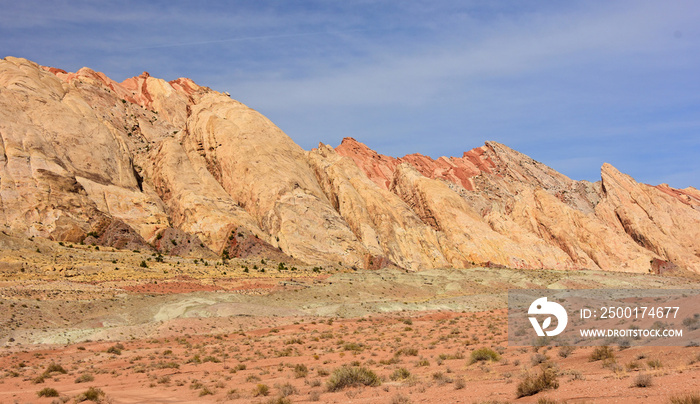 the  colorful flatiron rock formations in the san rafael reef near uneva canyon on a sunny day, near green river, utah