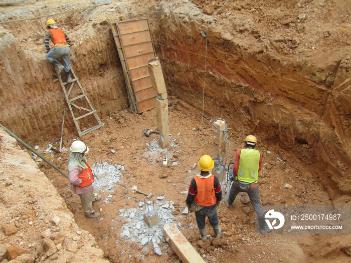 Excavated and cut to level bore pile at the construction site. Ready to construct pile cap reinforcement bar as next step of work.