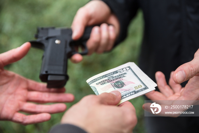 Person Buying Gun From Dealer