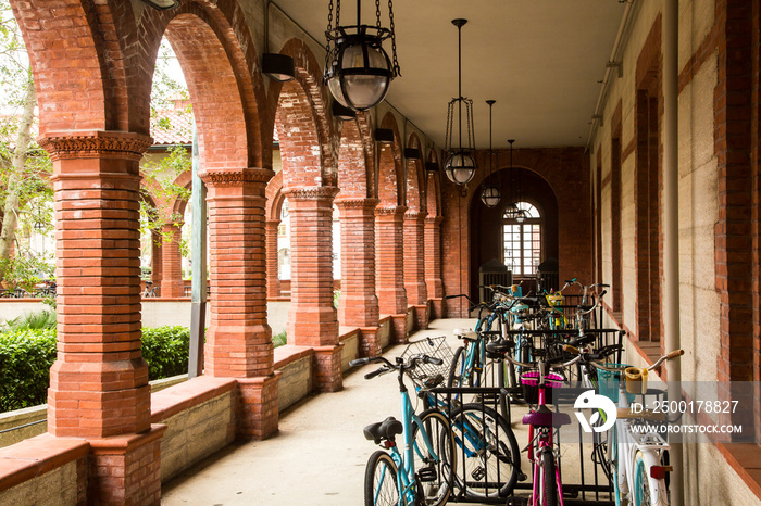 Student bicycles on a porch at   Flagler College.  It is a private four-year liberal arts college in St. Augustine, Florida. It was founded in 1968.