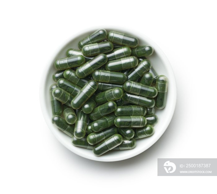 Green chlorella pills or green barley pills.