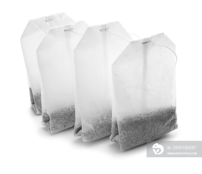 Tea bags on white background