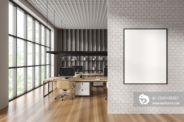 White brick open space office with poster