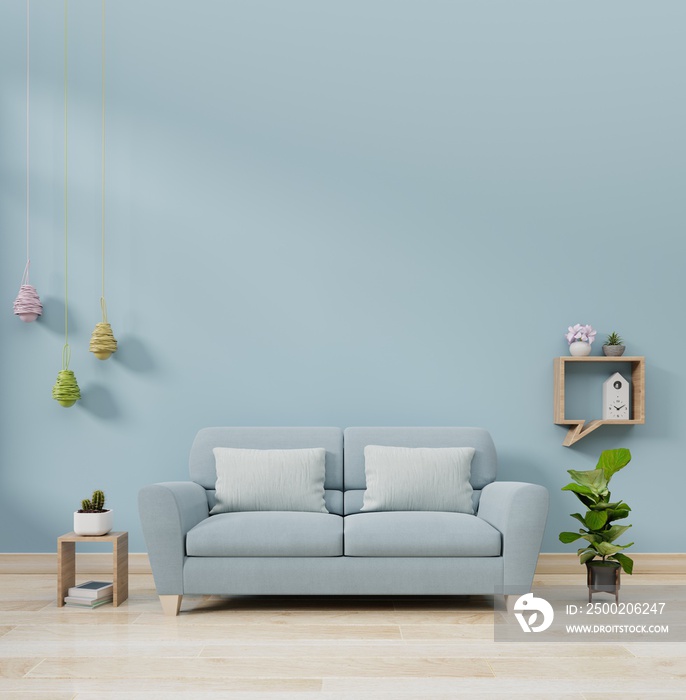 现代客厅内部，蓝色墙壁背景上有沙发灯和绿色植物，3d渲染。