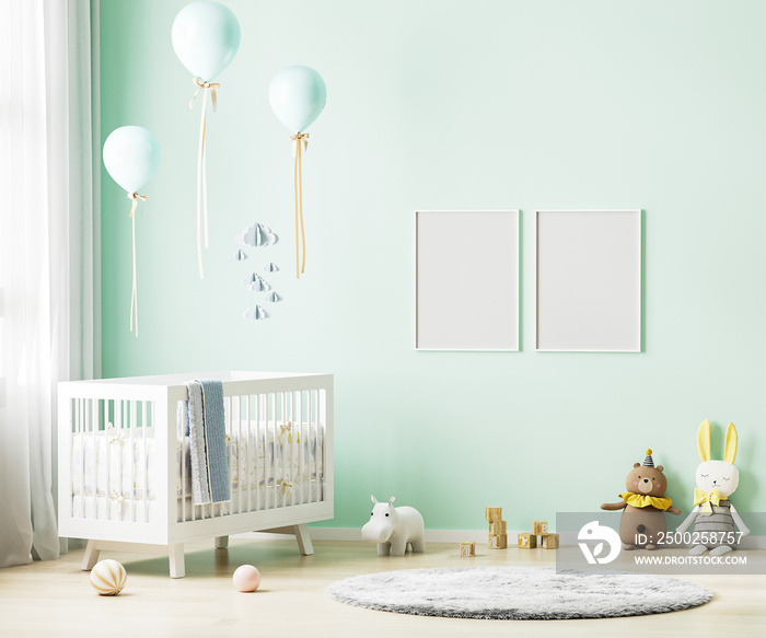 Blank poster frames mock up on green wall in nursery room interior background with baby bedding, sof