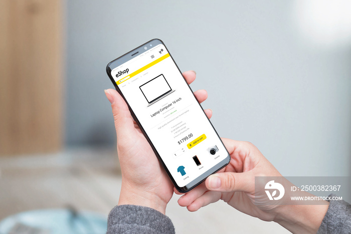 Web store app on smart phone. Concept of online shopping with mobile device. Close-up