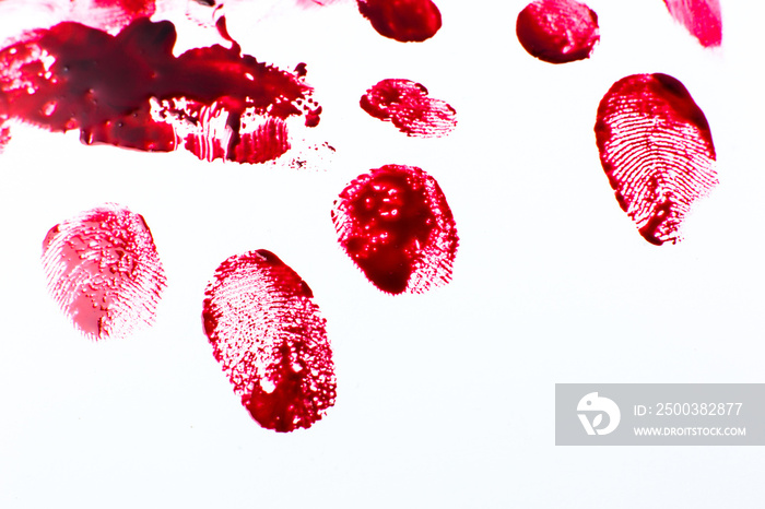 Red Bloody fingerprints on the white background. Horror and crime scene concept. Halloween postcard.