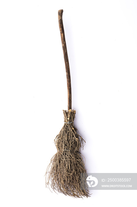 Old wicked witches broomstick isolated on white background, Halloween