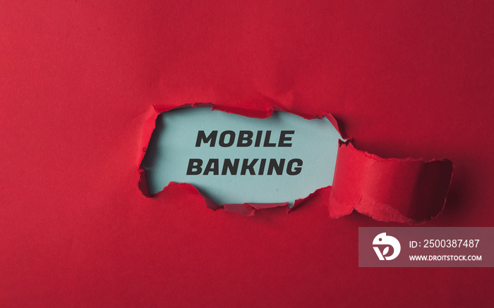 Text Mobile Banking on blue view through torn red paper