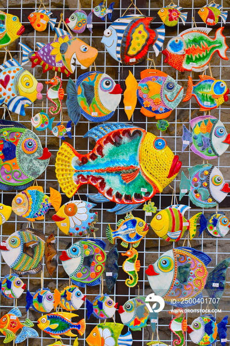 Colourful fish magnet souvenirs on sale in quaint quirky shop in the old town of Sozopol. Sozopol, B