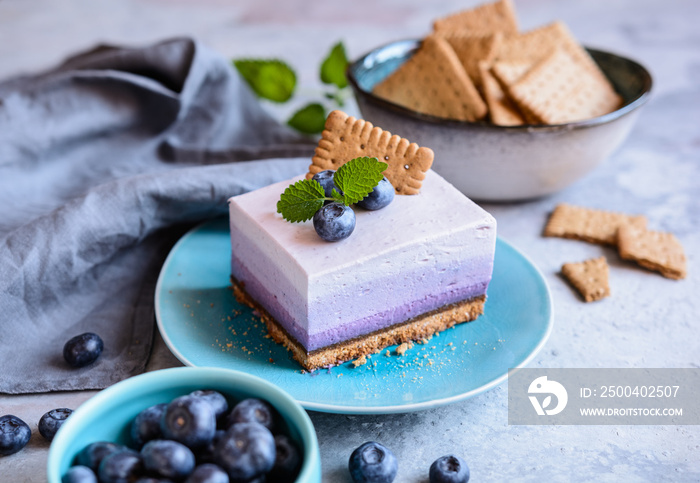 No bake blueberry cheesecake topped with fresh berries