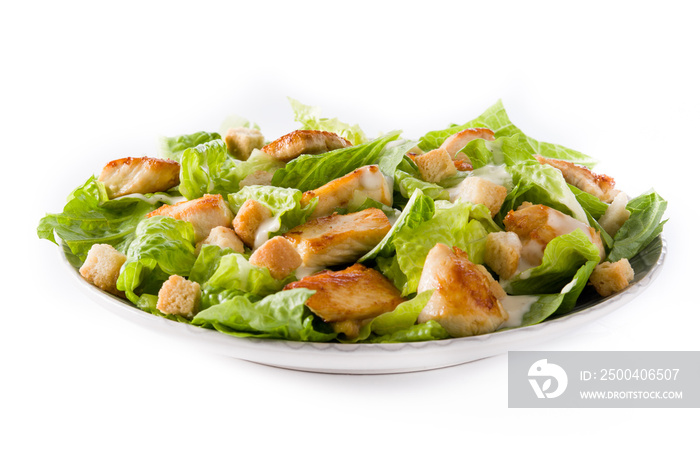 Caesar salad with lettuce,chicken and croutons isolated on white background.