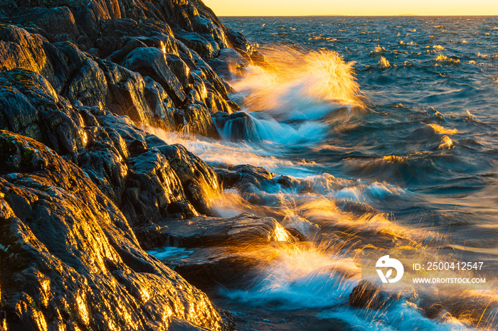 Waves crashing against shoreline at Lake Vättern, Sweden.