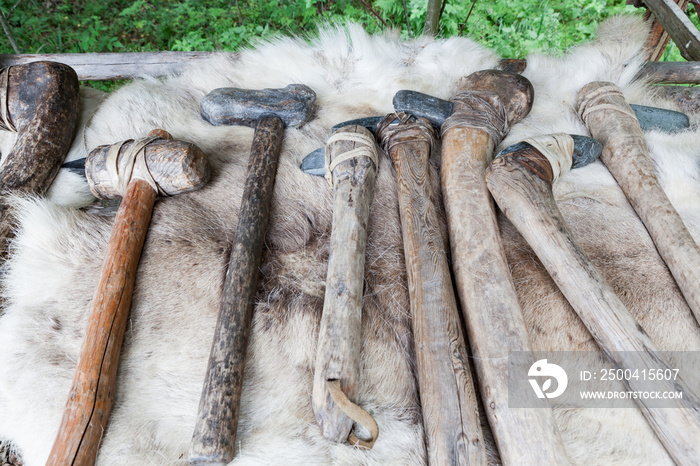 Different kind of stone age axes in a row