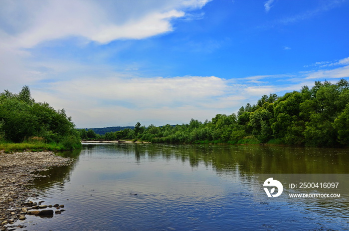 landscape with river and blue sky