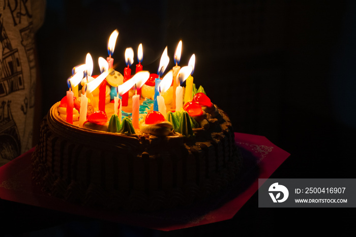 Candle lights on birthday cake