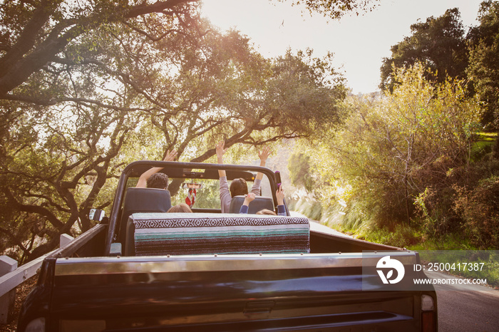 Family with two children (4-5) traveling by car