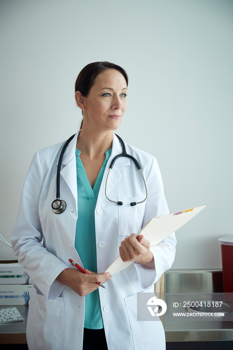 Doctor posing in medical office